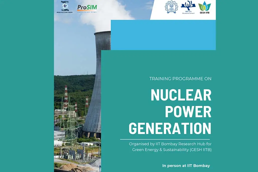A nuclear power station cooling tower beside the IIT Bombay programme branding